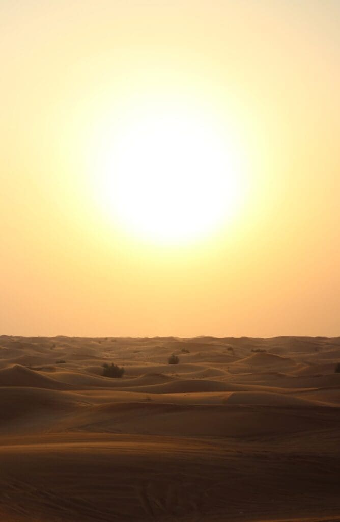 scorching hot day with broken ac beige sand during sunset